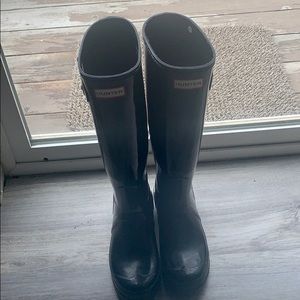 Black tall Hunter rain boots